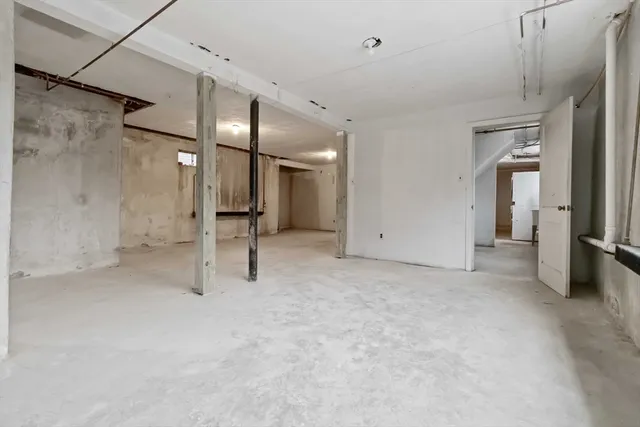 a view of a big room with a chandelier