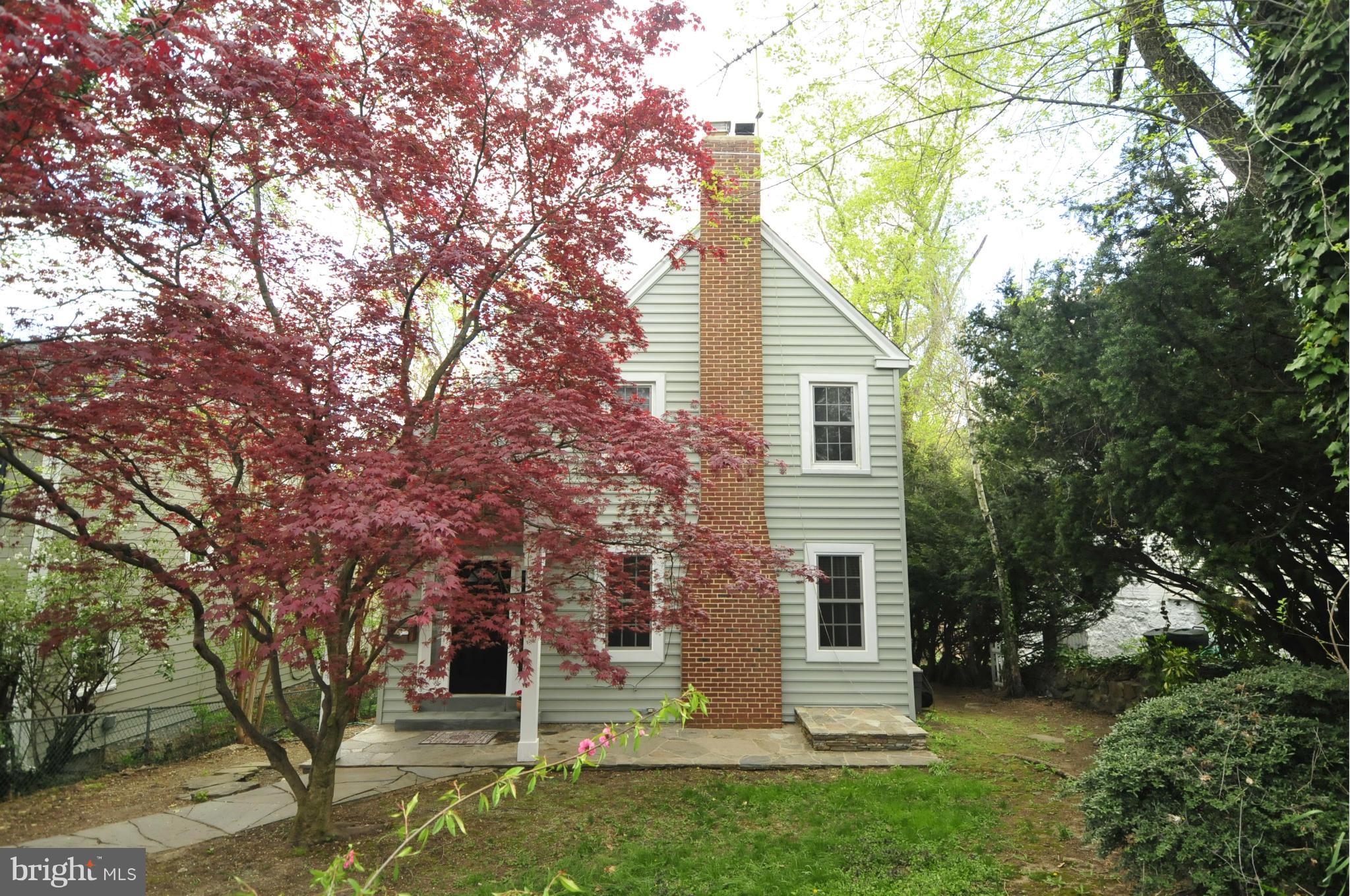 1825 Fairbank Road Baltimore, MD 21209 - Photo 1 of 27 a view of a house with a yard