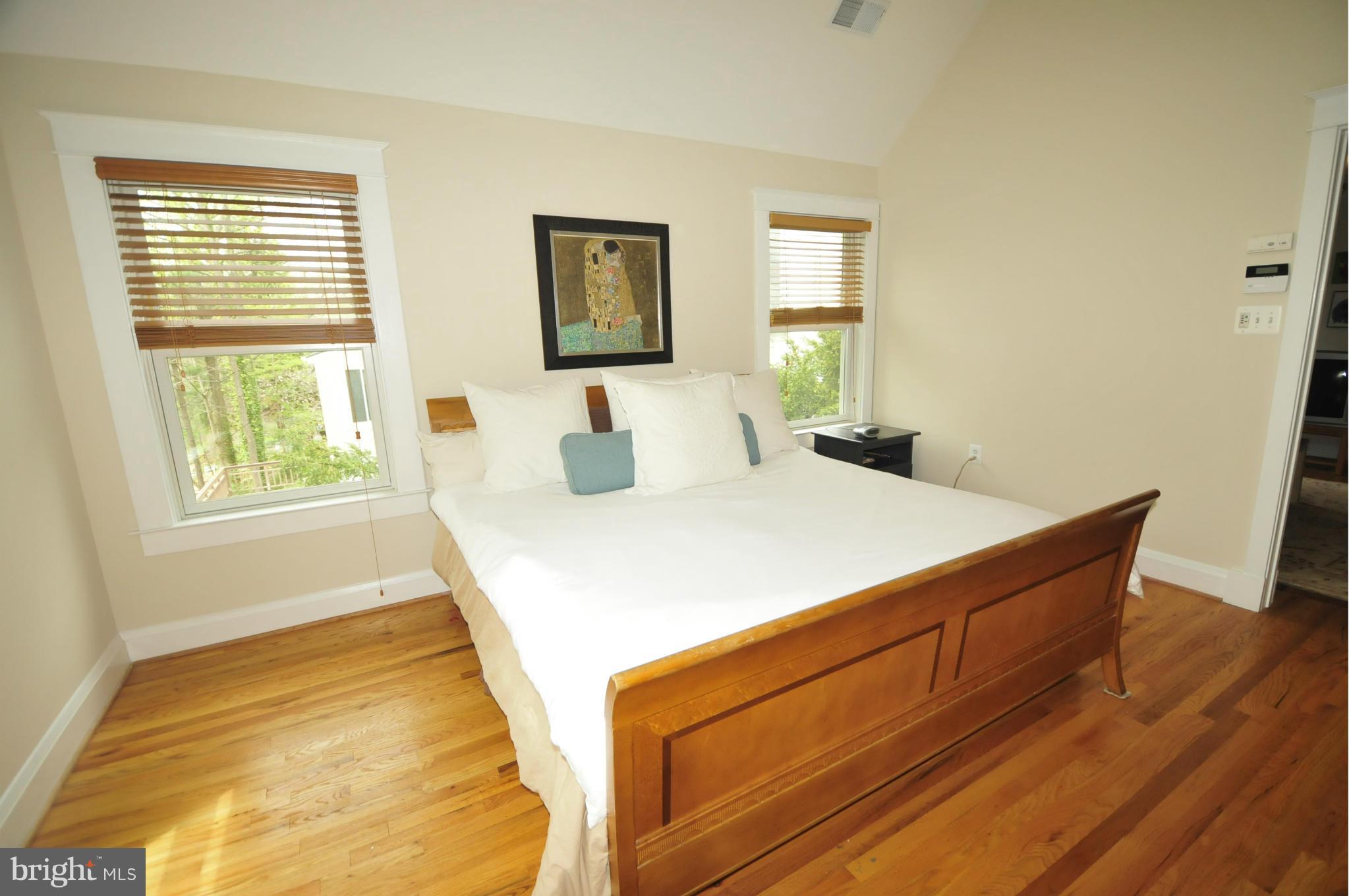 1825 Fairbank Road Baltimore, MD 21209 - Photo 14 of 27 a room with a bed and a window
