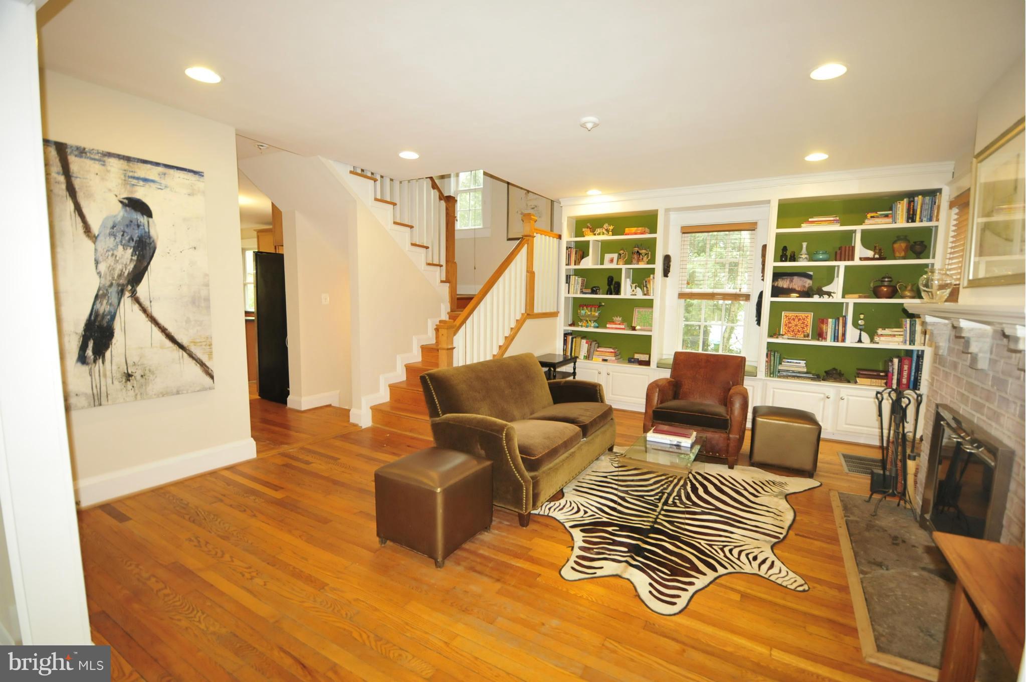 1825 Fairbank Road Baltimore, MD 21209 - Photo 3 of 27 a living room with furniture a rug and a large window