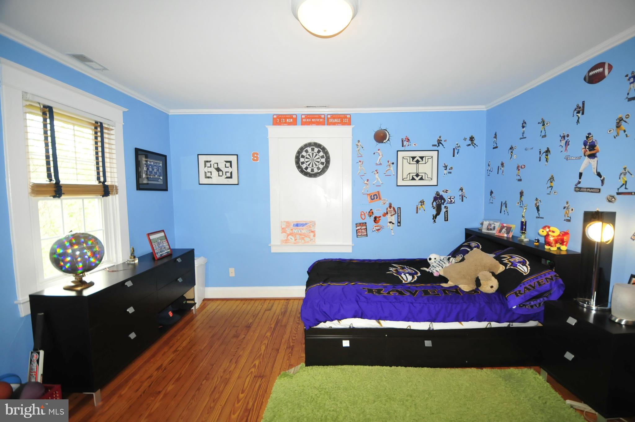 1825 Fairbank Road Baltimore, MD 21209 - Photo 22 of 27 a living room with furniture and wooden floor