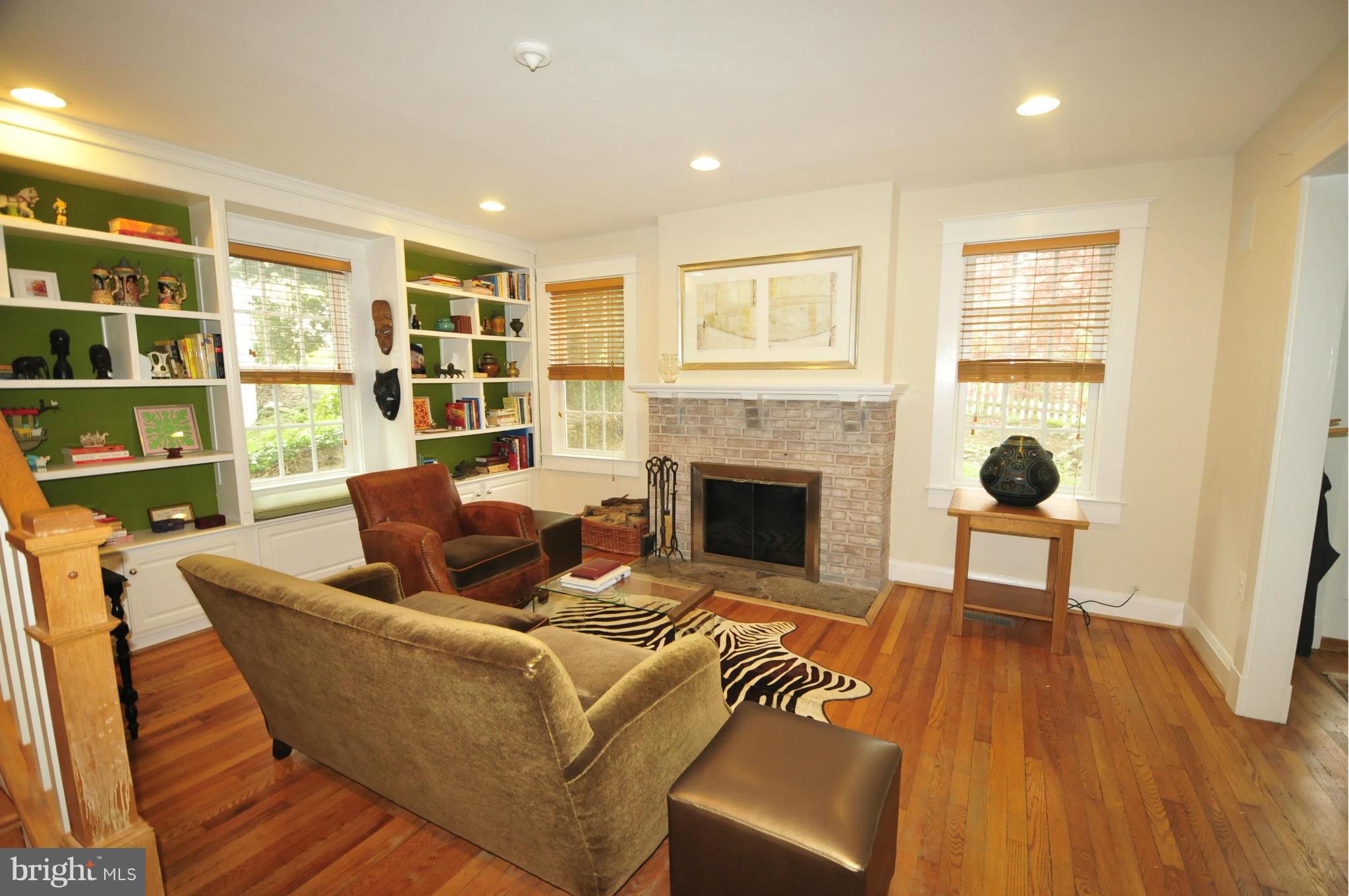 1825 Fairbank Road Baltimore, MD 21209 - Photo 4 of 27 a living room with furniture and a fireplace