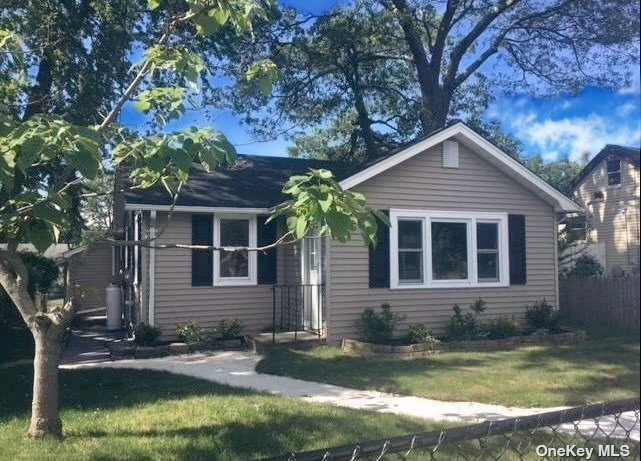 14 Green Avenue Patchogue, NY 11772 - Photo 1 of 1 front view of house with a yard