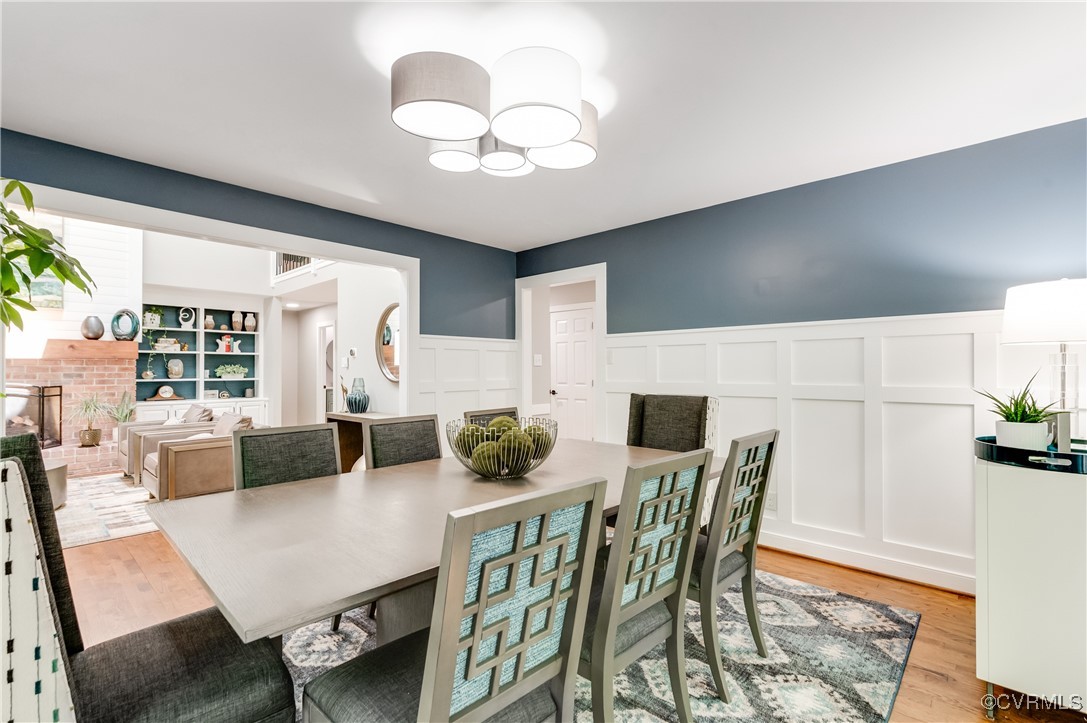 3510 Lansdowne Road Midlothian, VA 23113 - Photo 12 of 47 a view of a dining room with furniture and wooden floor