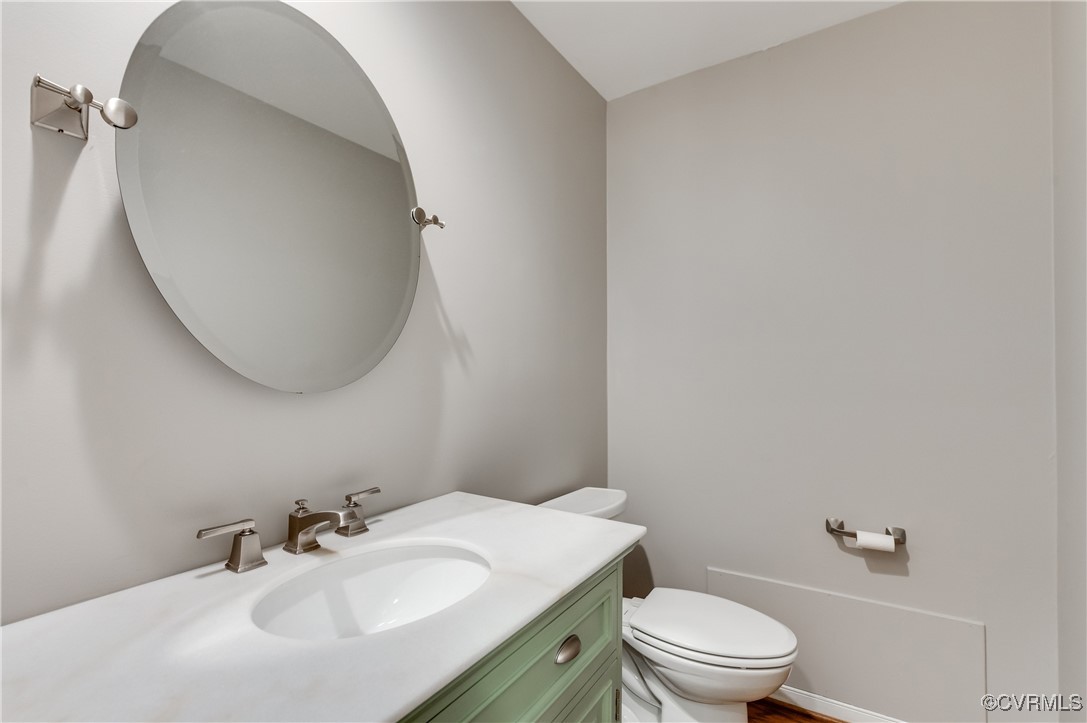3510 Lansdowne Road Midlothian, VA 23113 - Photo 25 of 47 a bathroom with a sink a toilet and a mirror