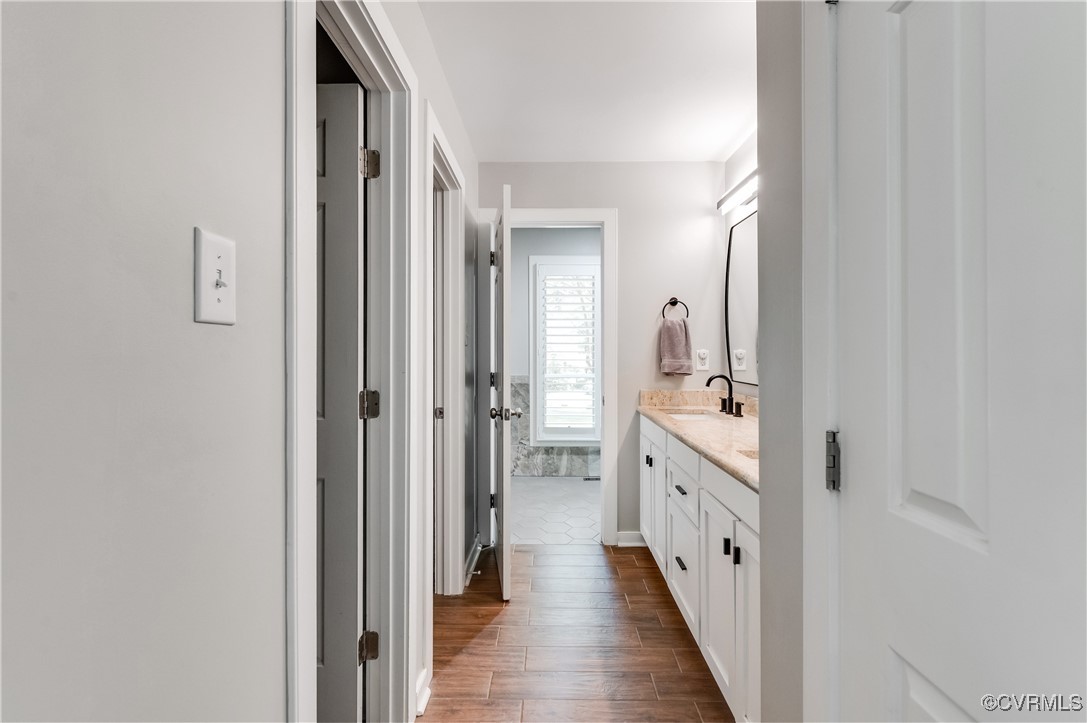 3510 Lansdowne Road Midlothian, VA 23113 - Photo 28 of 47 a hallway with white cabinets and wooden floor
