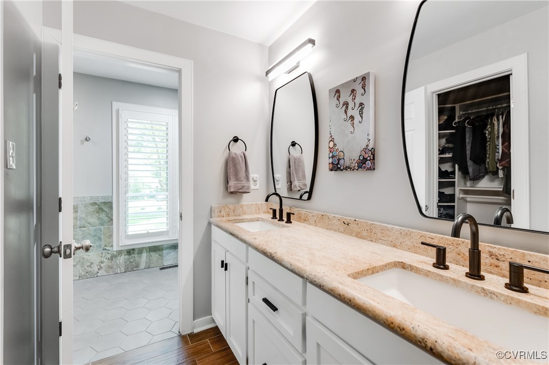 3510 Lansdowne Road Midlothian, VA 23113 - Photo 29 of 47 a bathroom with a double vanity sink and a mirror