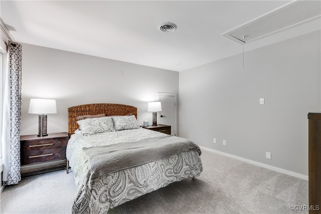 3510 Lansdowne Road Midlothian, VA 23113 - Photo 34 of 47 a bedroom with a bed and a lamp