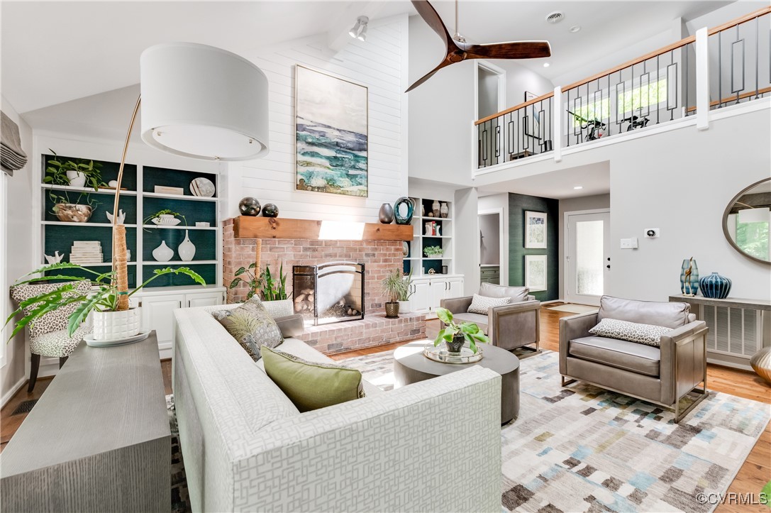 3510 Lansdowne Road Midlothian, VA 23113 - Photo 9 of 47 a living room with furniture fireplace and a large window