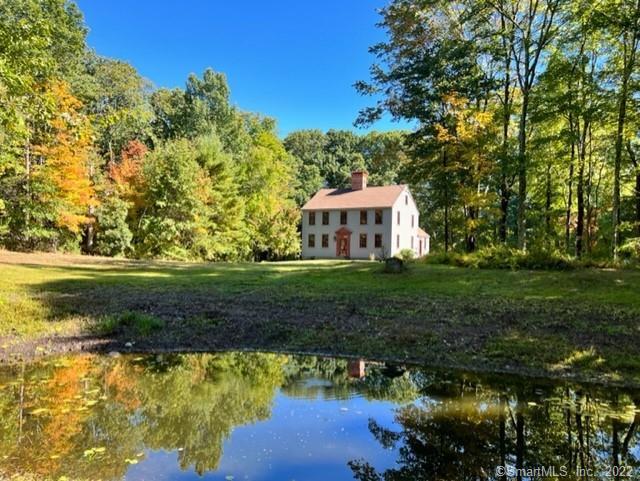 This home is not to be missed!!!! Unique private oasis with pond and huge two- storey barn!!
