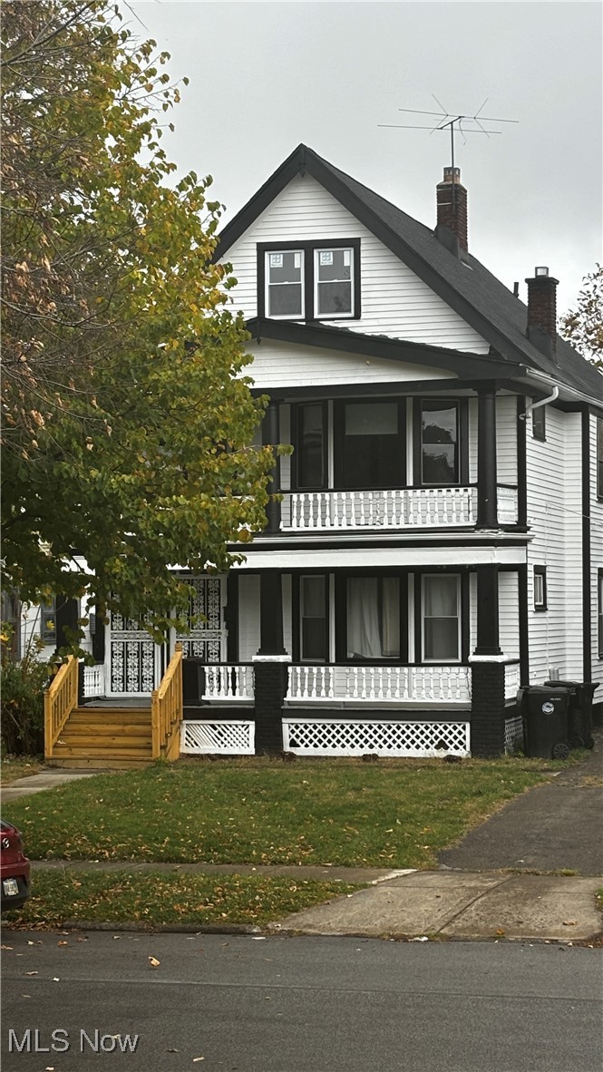 13421 Ashburton Road Cleveland, OH 44110 - Photo 2 of 28 View of front facade with covered porch