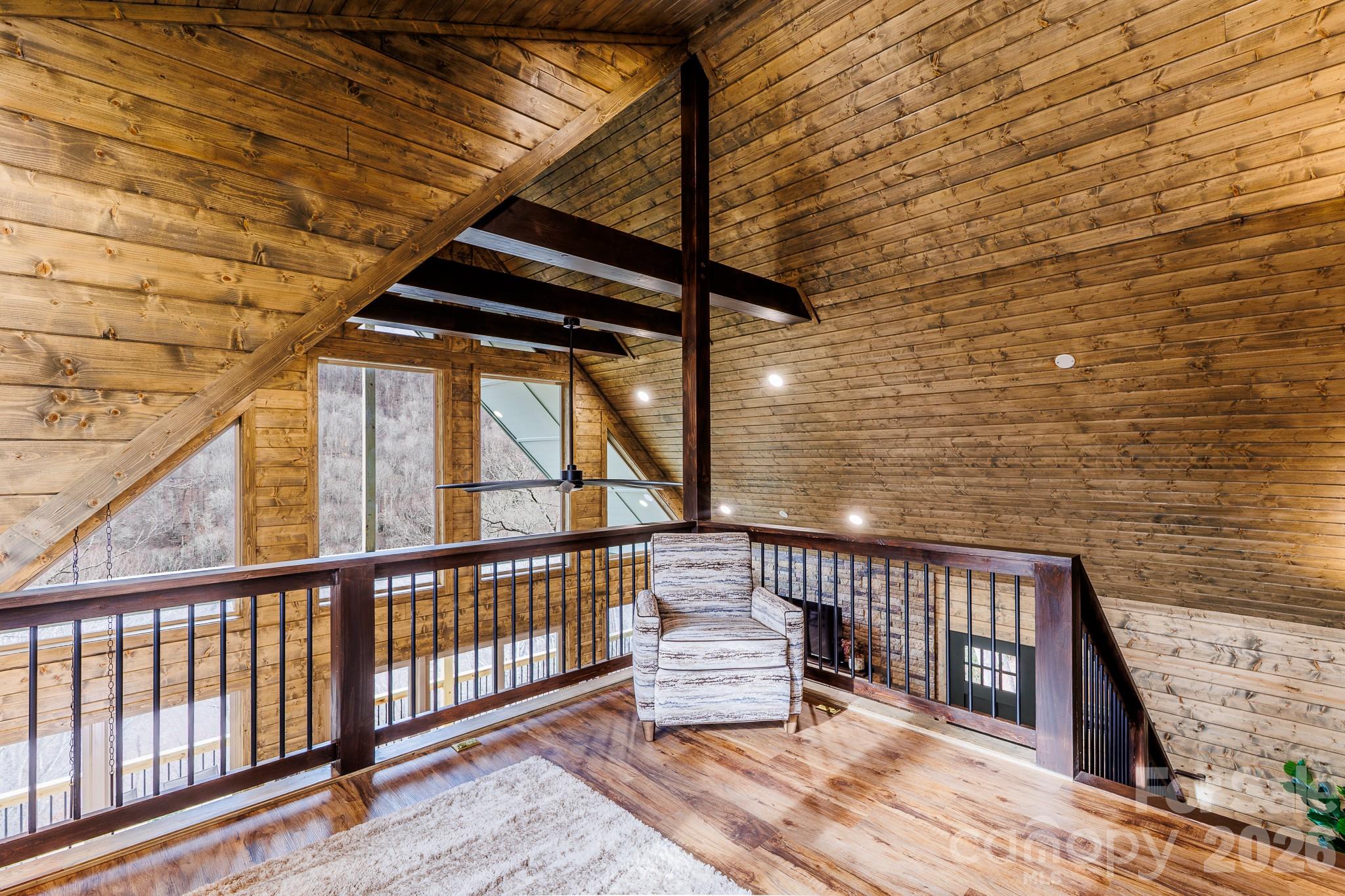 601 Tater Patch Road Maggie Valley, NC 28751 - Photo 11 of 32 a view of balcony with wooden floor