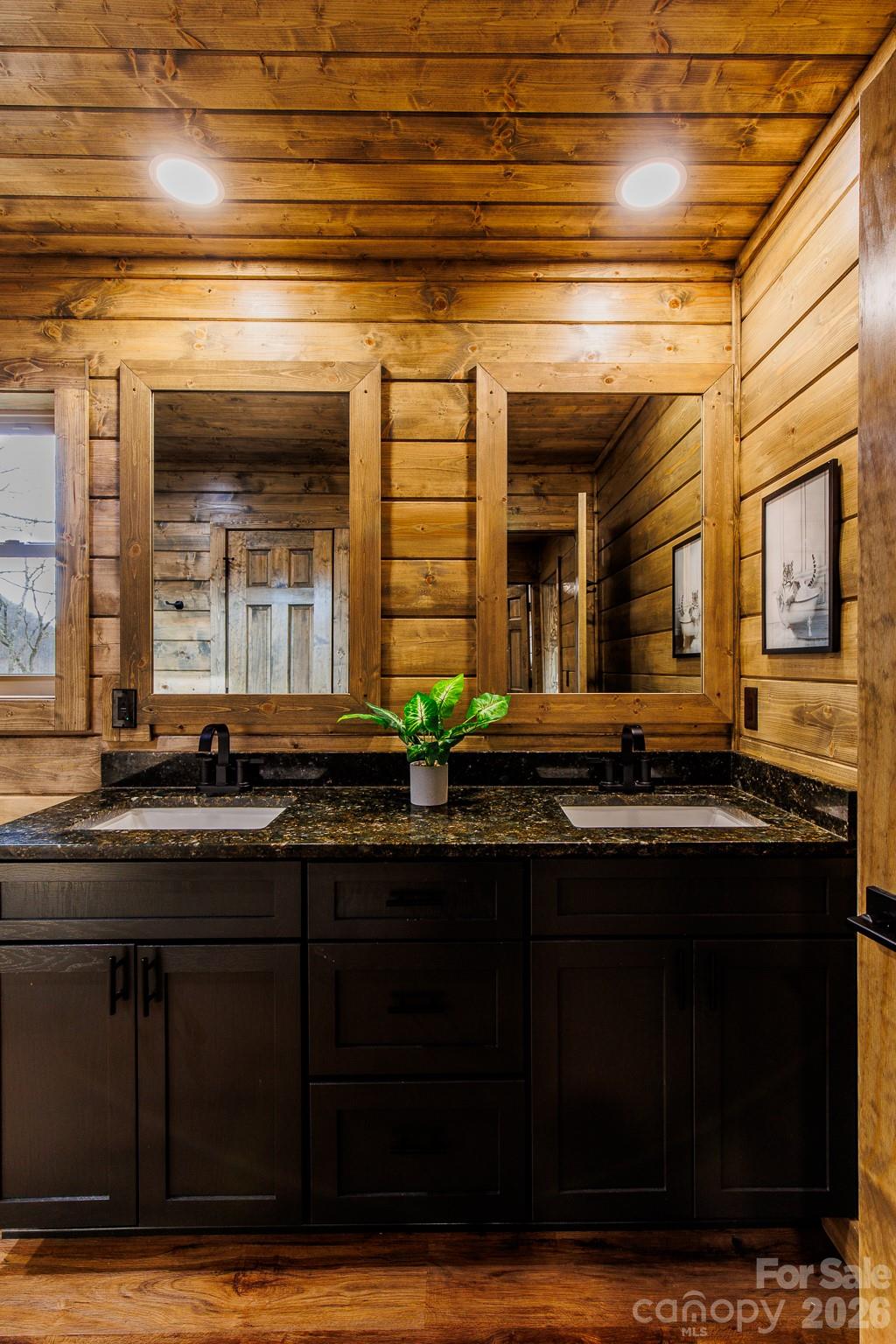 601 Tater Patch Road Maggie Valley, NC 28751 - Photo 19 of 32 a kitchen with a sink and cabinets