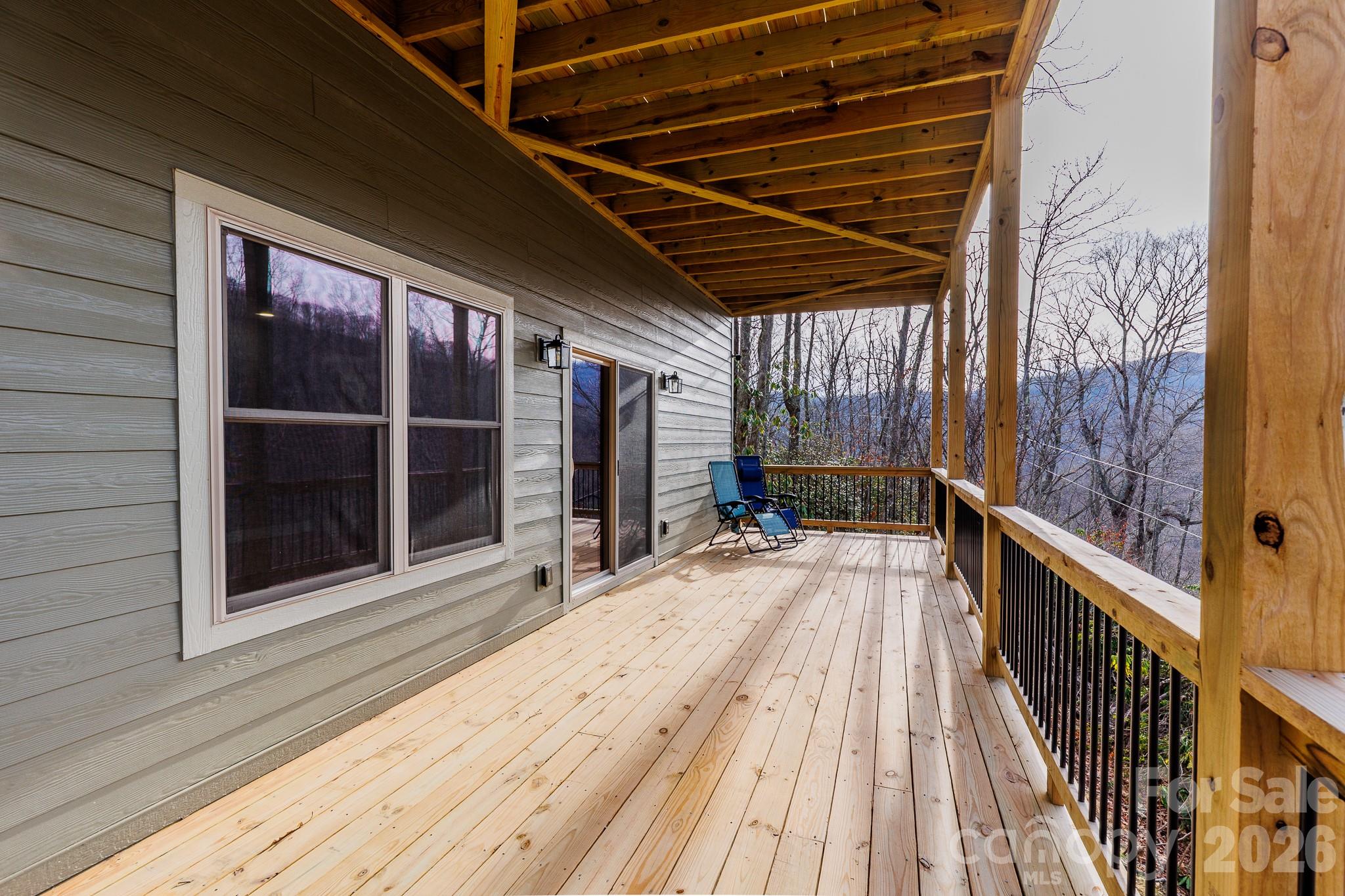601 Tater Patch Road Maggie Valley, NC 28751 - Photo 27 of 32 a view of a balcony with wooden floor