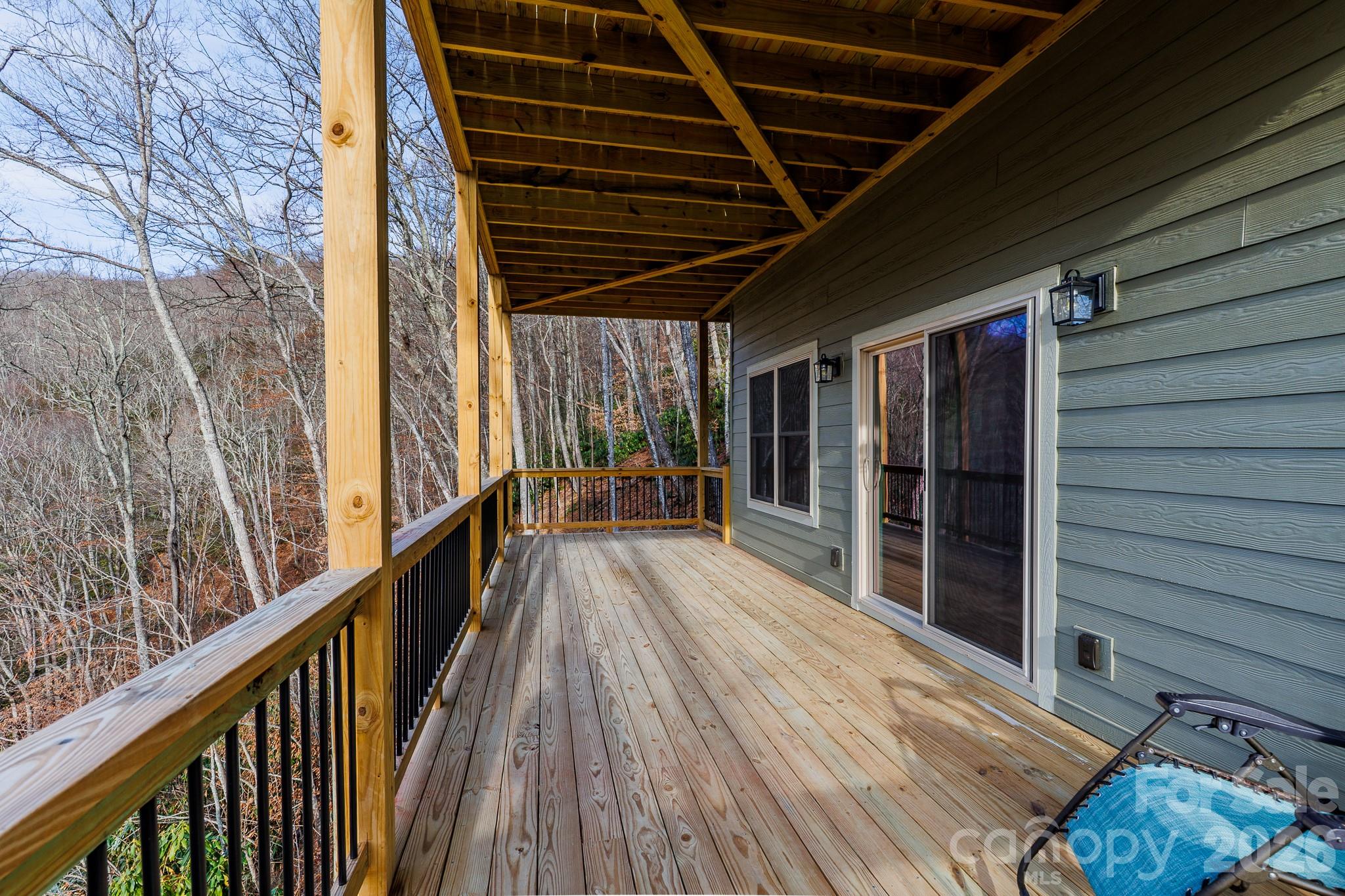 601 Tater Patch Road Maggie Valley, NC 28751 - Photo 28 of 32 a view of balcony with wooden floor