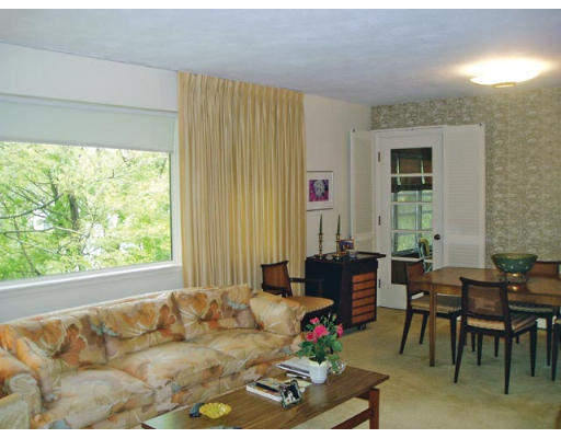 225 Country Club Road Newton, MA 02459 - Photo 3 of 5 a living room with furniture and a large window