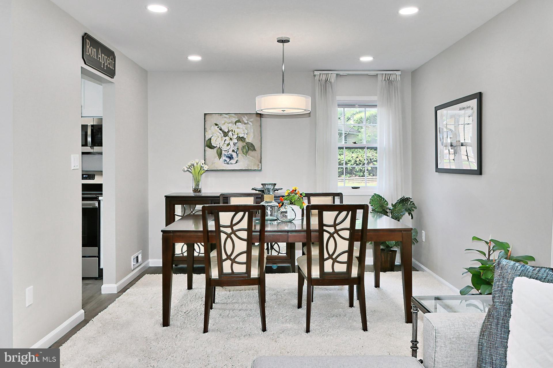 6401 Limerick Court Springfield, VA 22152 - Photo 8 of 50 Dining room features new light fixture & LVP floor