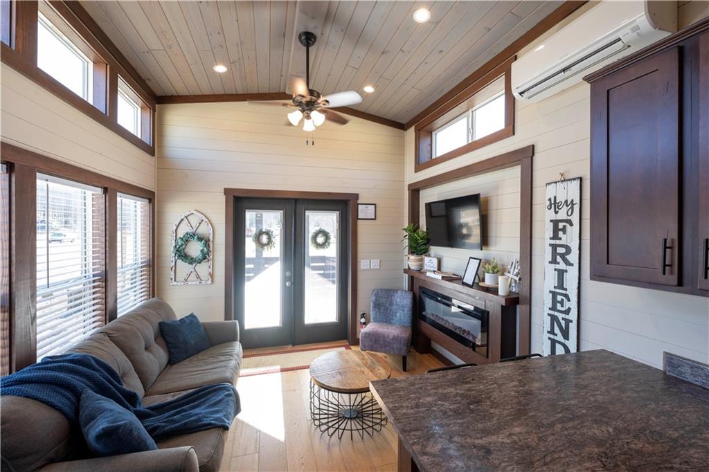 192 Mountain Road Morganton, GA 30560 - Photo 11 of 42 a living room with furniture and a large window