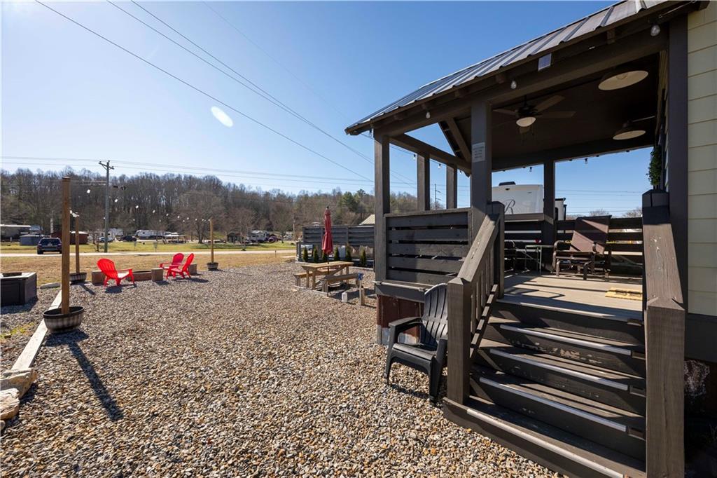 192 Mountain Road Morganton, GA 30560 - Photo 22 of 42 a view of a roof deck with wooden fence