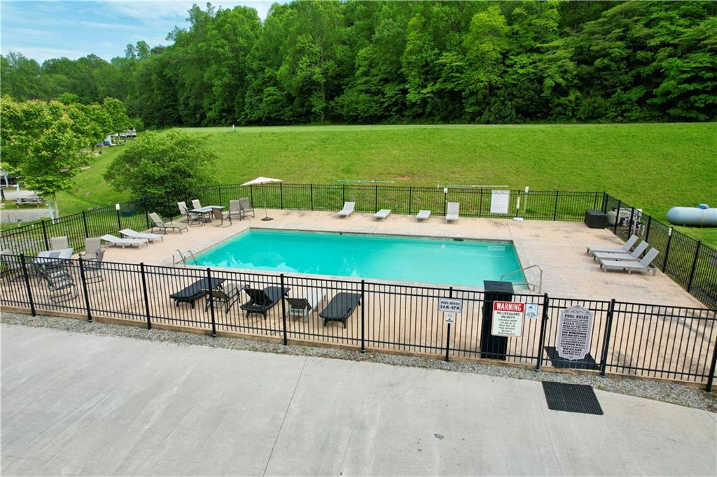 192 Mountain Road Morganton, GA 30560 - Photo 36 of 42 a view of a swimming pool with a patio