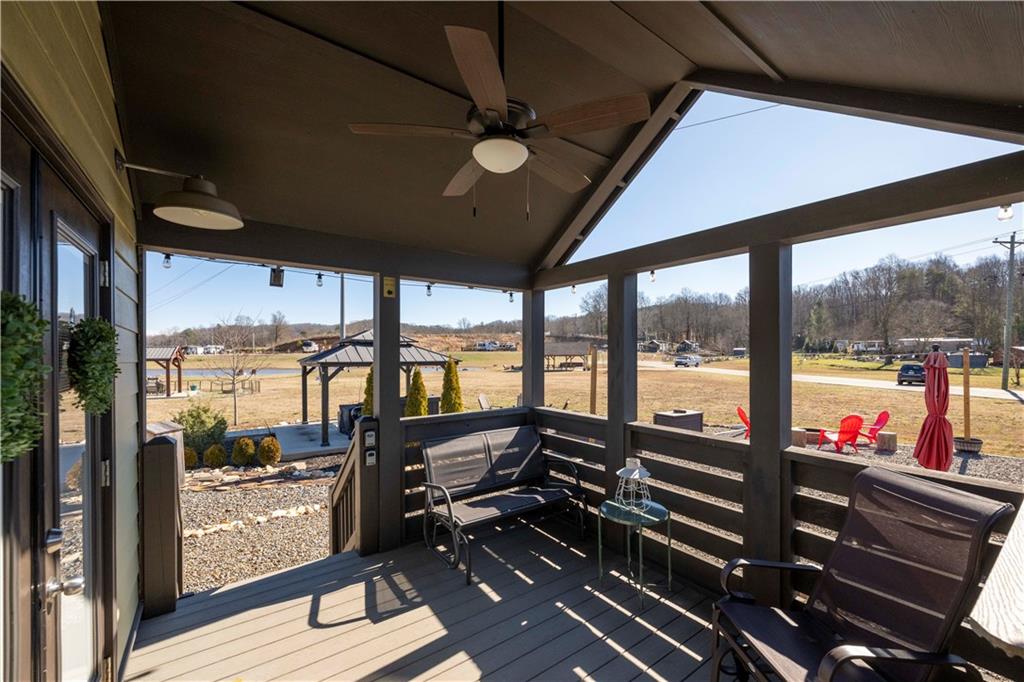 192 Mountain Road Morganton, GA 30560 - Photo 5 of 42 a living room with large windows