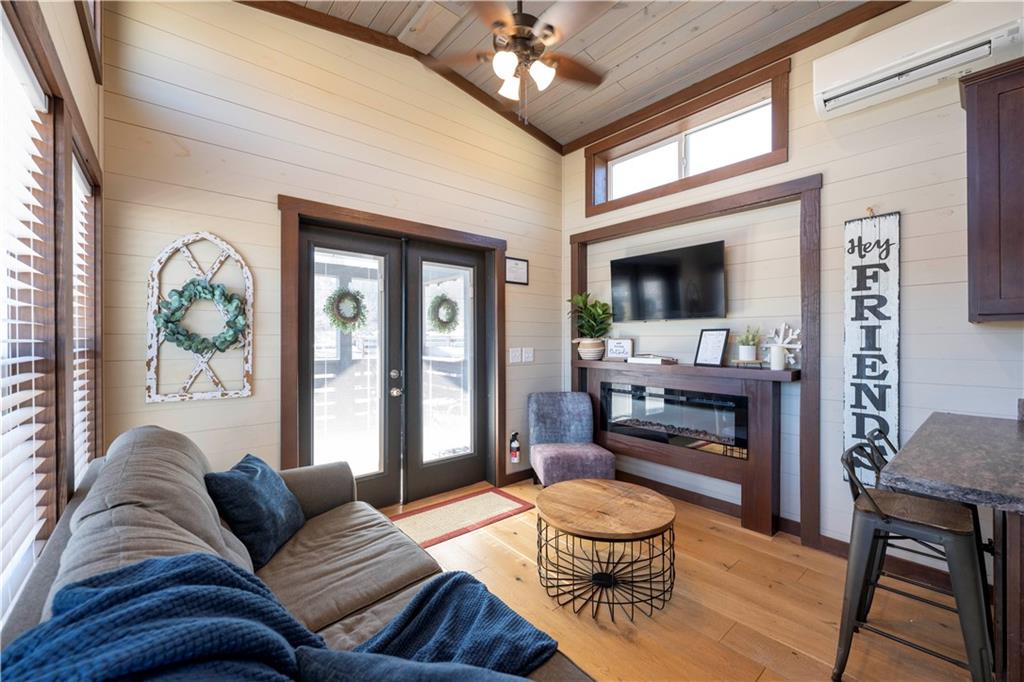 192 Mountain Road Morganton, GA 30560 - Photo 10 of 42 a living room with furniture and a large window