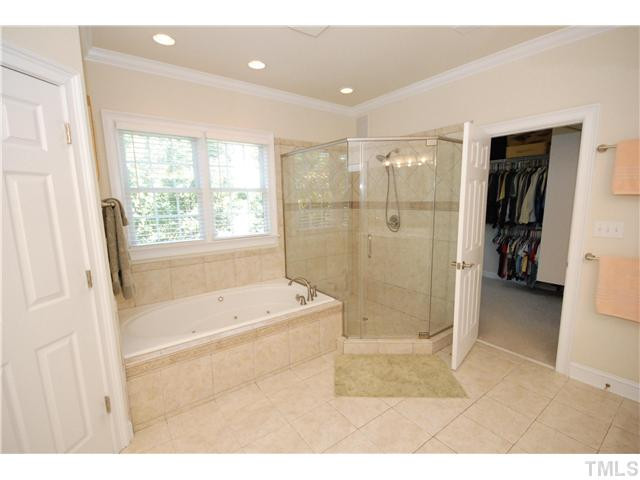 5308 Tallowtree Drive Raleigh, NC 27613 - Photo 11 of 25 Ceramic tile shower and floor, crown molding even in the bathroom! Master Bath/Spa