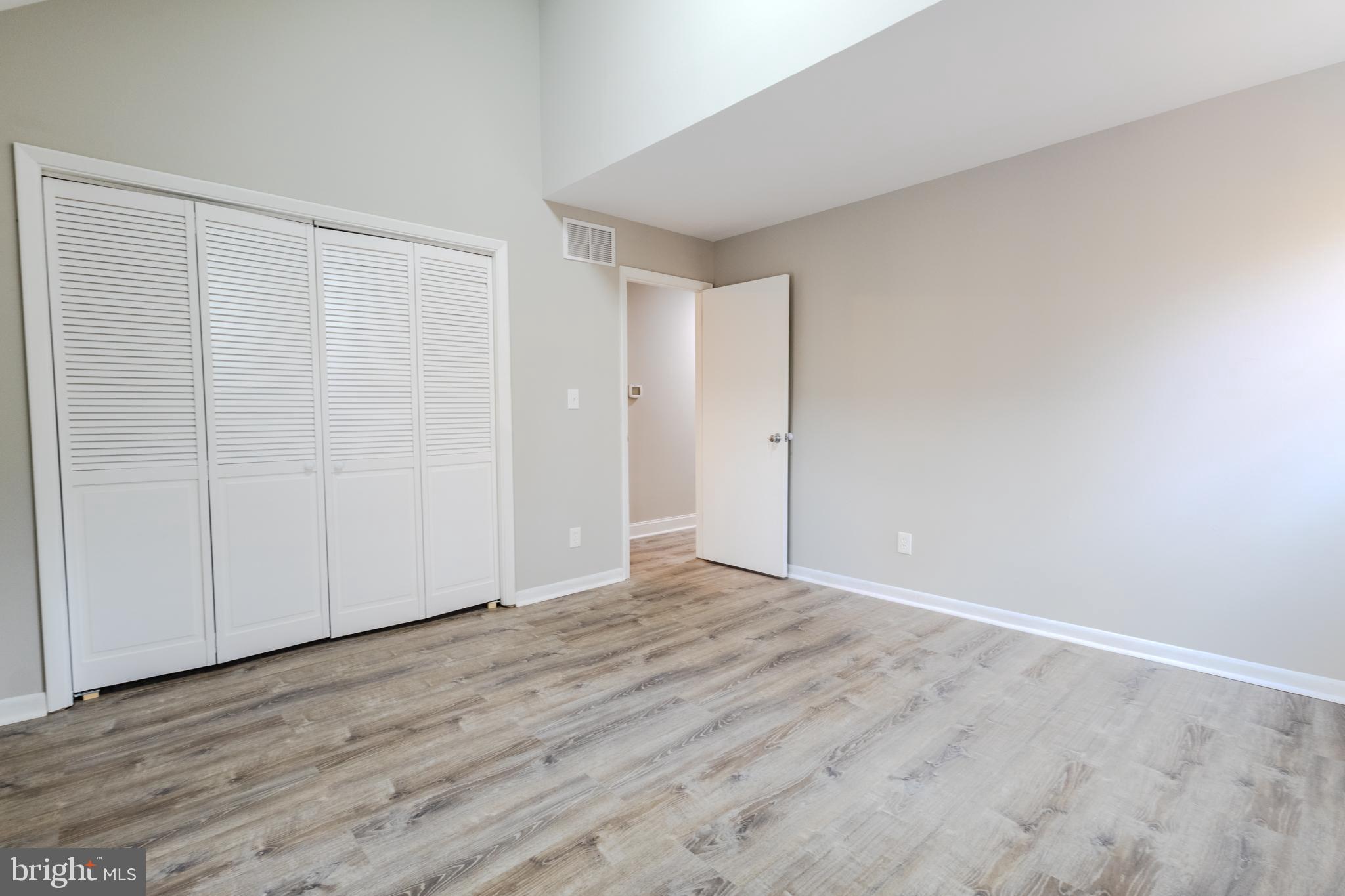 524 Ridge Road Annapolis, MD 21401 - Photo 21 of 53 a view of an empty room with wooden floor