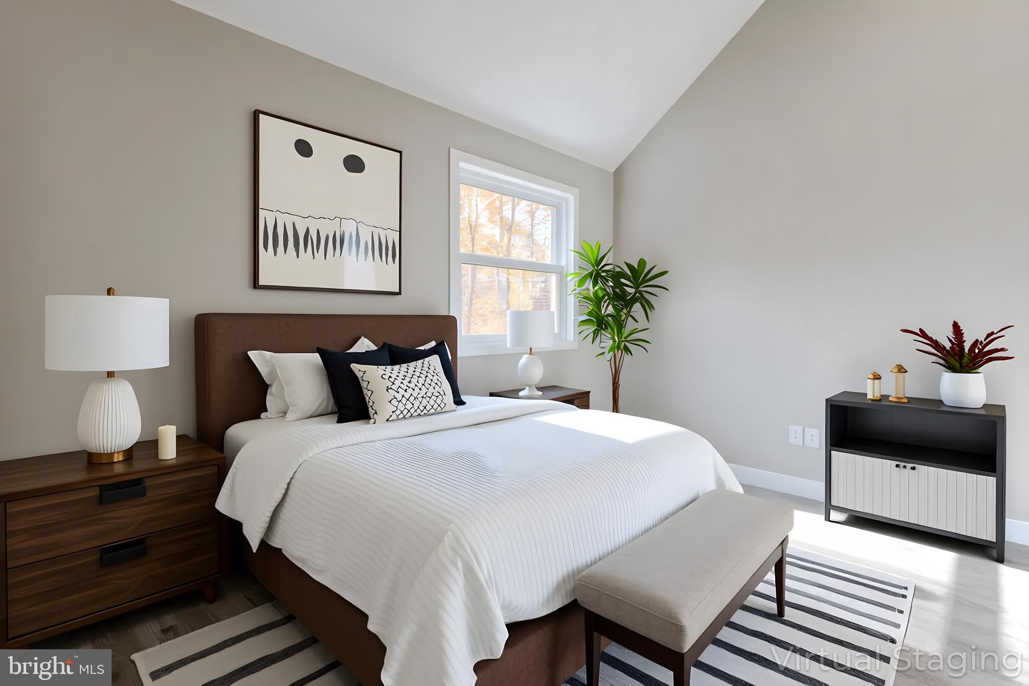 524 Ridge Road Annapolis, MD 21401 - Photo 25 of 53 a bedroom with a bed and a lamp