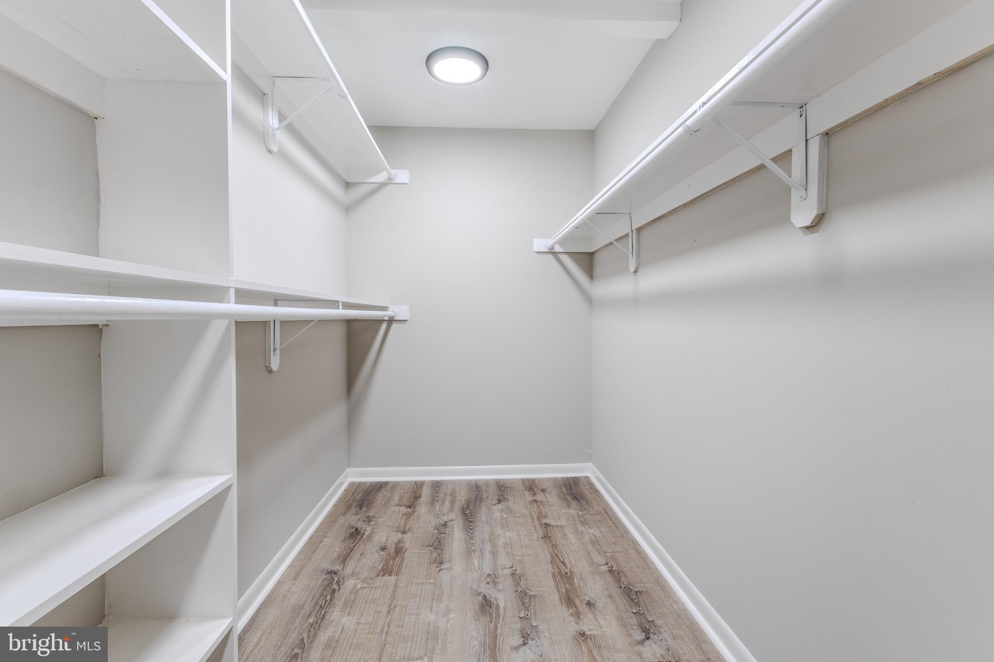 524 Ridge Road Annapolis, MD 21401 - Photo 33 of 53 a view of walk in closet with empty racks