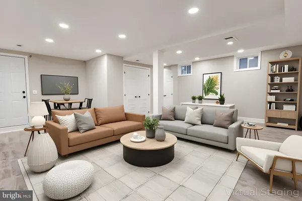 a view of an empty room with wooden floor and closet