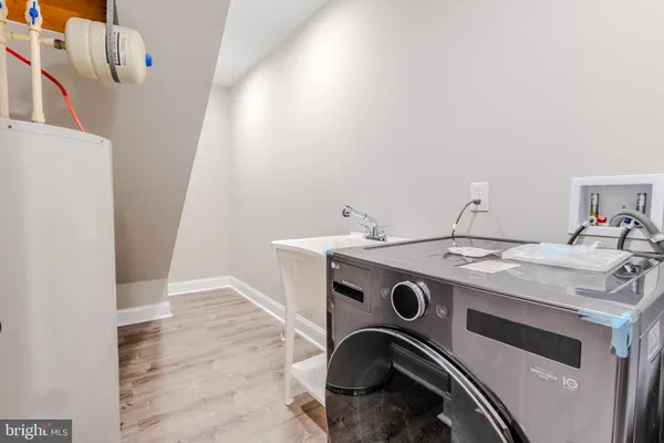 a bathroom with a glass door shower