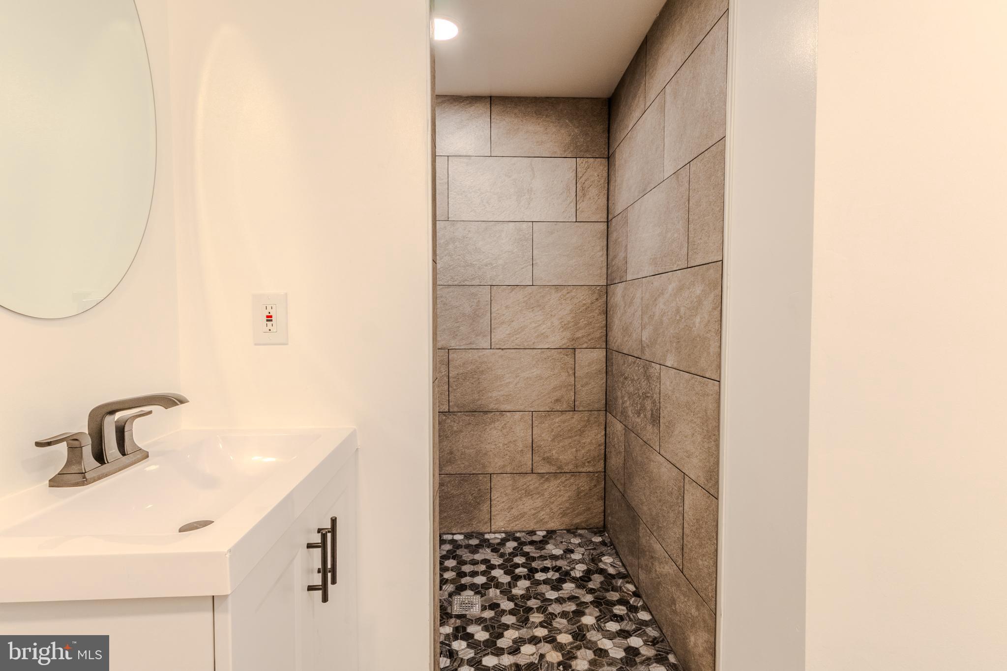 524 Ridge Road Annapolis, MD 21401 - Photo 46 of 53 a bathroom with a shower