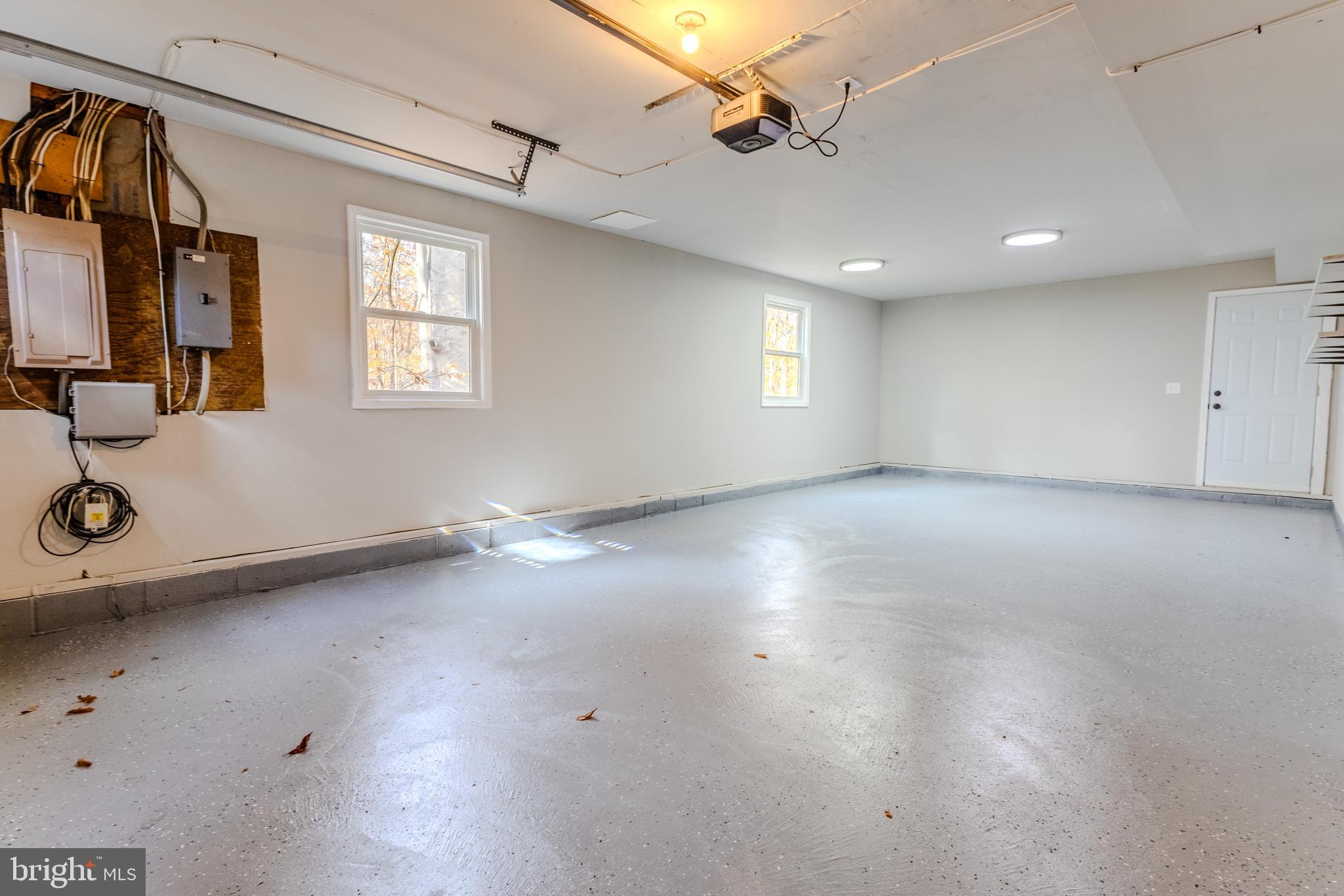 524 Ridge Road Annapolis, MD 21401 - Photo 48 of 53 wooden floor in an empty room with a window