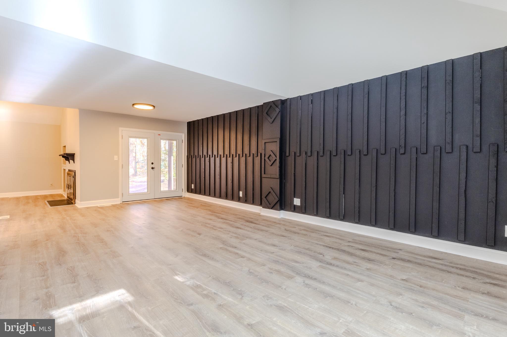 524 Ridge Road Annapolis, MD 21401 - Photo 7 of 53 a view of an empty room with wooden floor