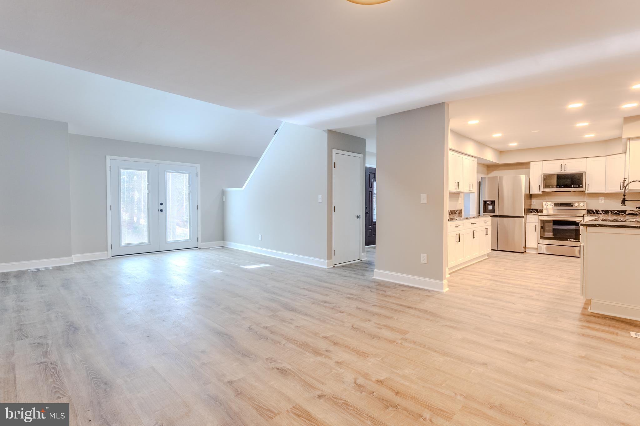 524 Ridge Road Annapolis, MD 21401 - Photo 9 of 53 a view of a kitchen with a sink and a refrigerator