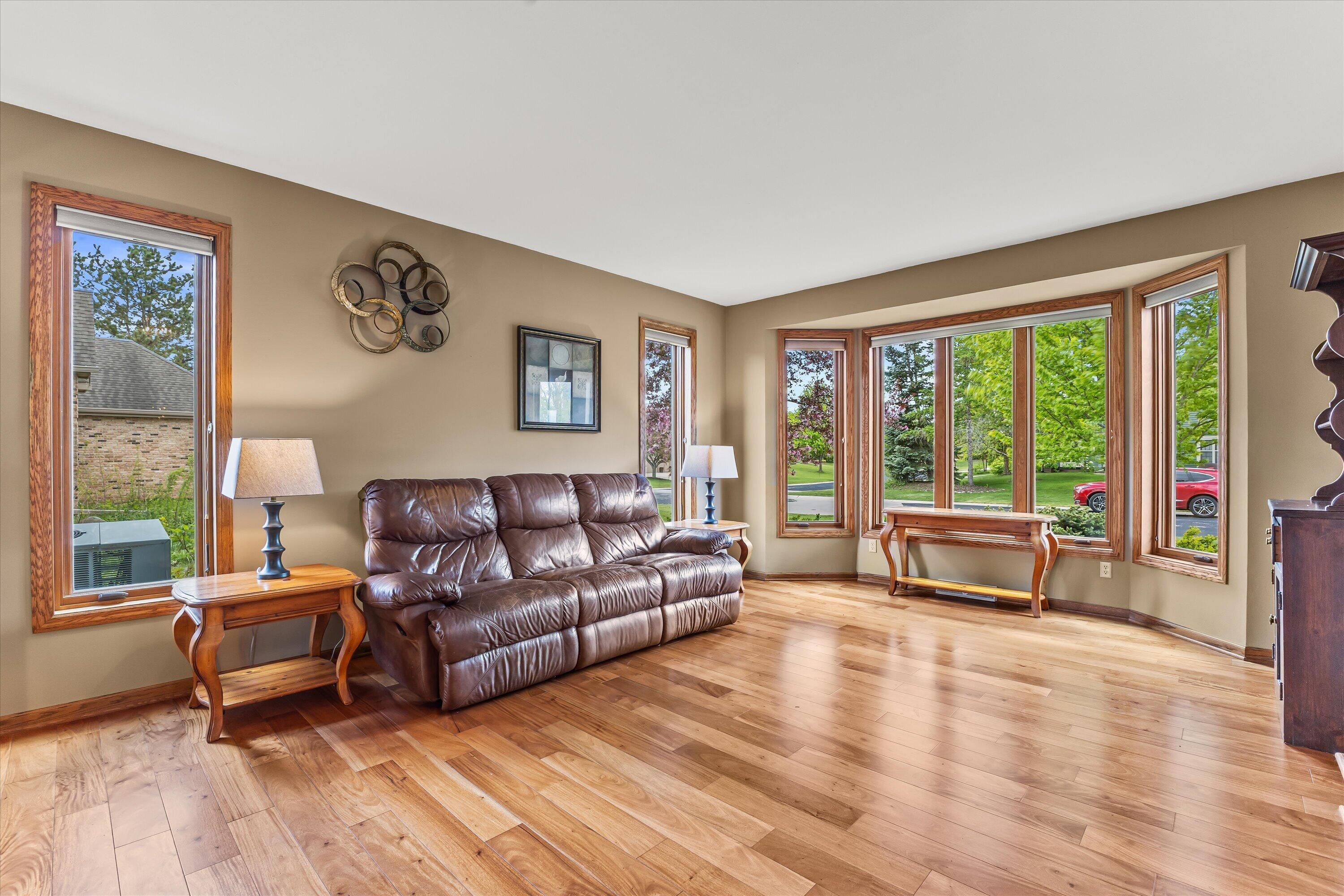 W168N5140 Stonefield Road Menomonee Falls, WI 53051 - Photo 11 of 49 Bright and sunny family room
