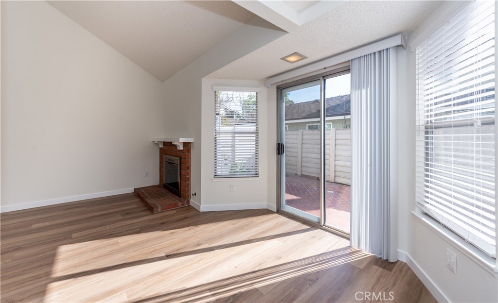 49 Summerstone Irvine, CA 92614 - Photo 12 of 28 a bedroom with a bed and wooden floor