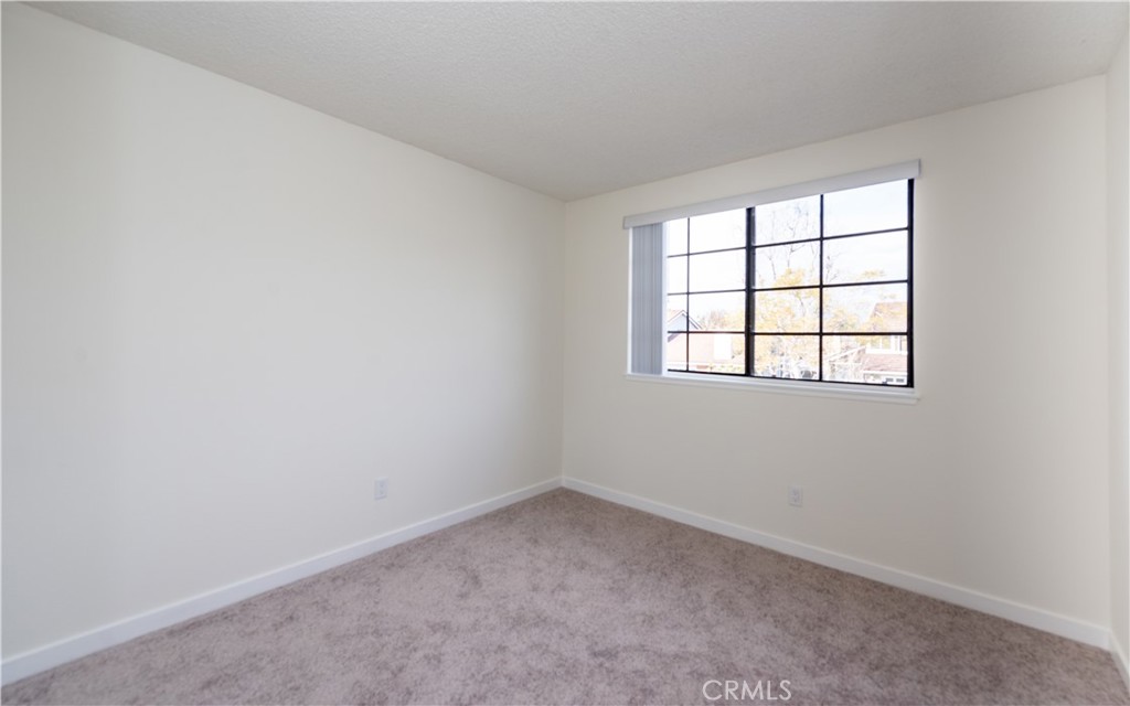 49 Summerstone Irvine, CA 92614 - Photo 14 of 28 an empty room with a window