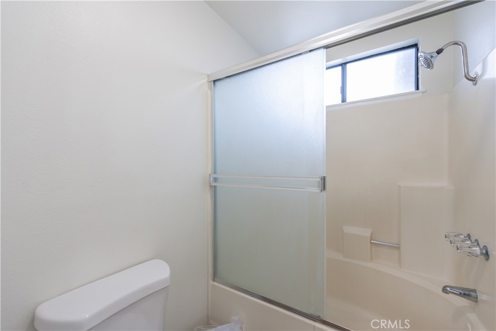 49 Summerstone Irvine, CA 92614 - Photo 22 of 28 a bathroom with a shower and a toilet
