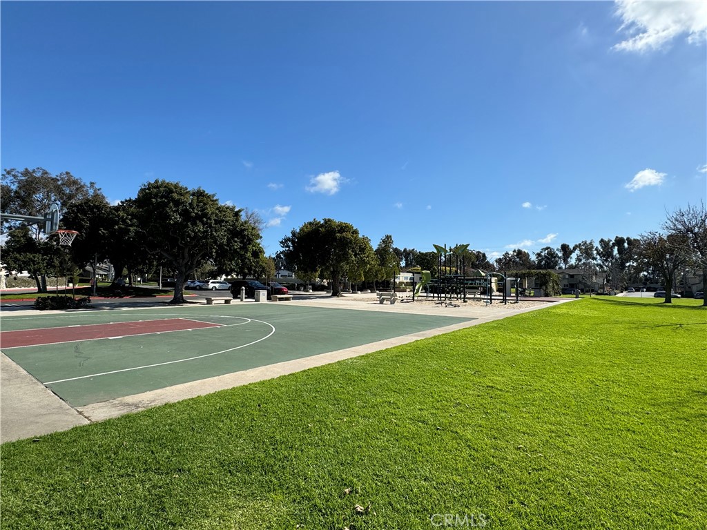 49 Summerstone Irvine, CA 92614 - Photo 27 of 28 a view of a golf course with a lake