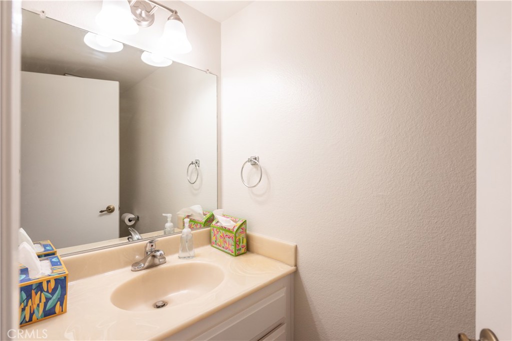 49 Summerstone Irvine, CA 92614 - Photo 7 of 28 a bathroom with a sink and a mirror