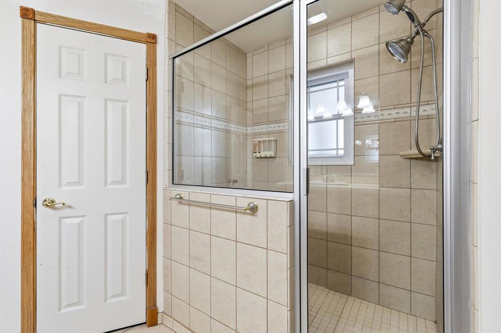 123 Valley Ranch Road Sherman, TX 75092 - Photo 17 of 40 Bathroom with a shower stall