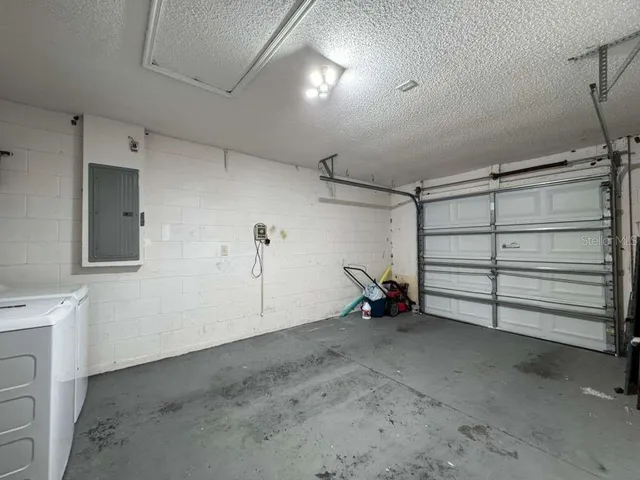 a view of a chairs and table in the balcony