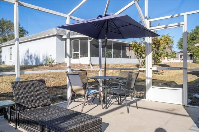 a kitchen with stainless steel appliances a stove and a microwave