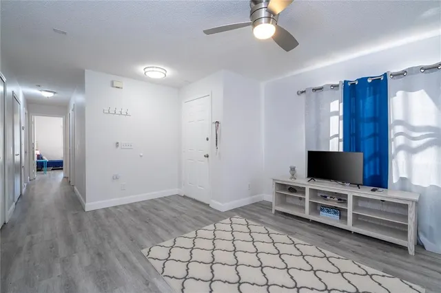 a bathroom with a sink toilet a shower and a mirror