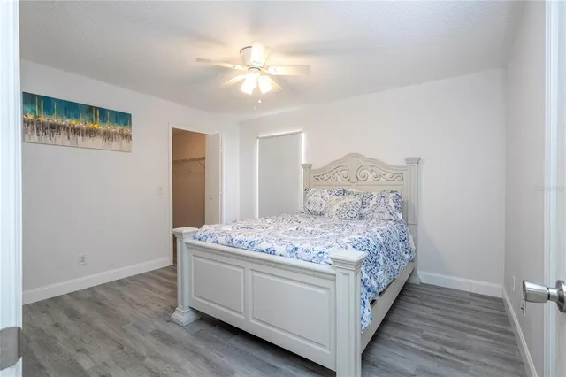 a bathroom with a granite countertop sink a mirror and a vanity