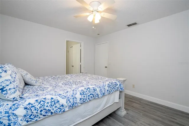 a room that has a bed and a window