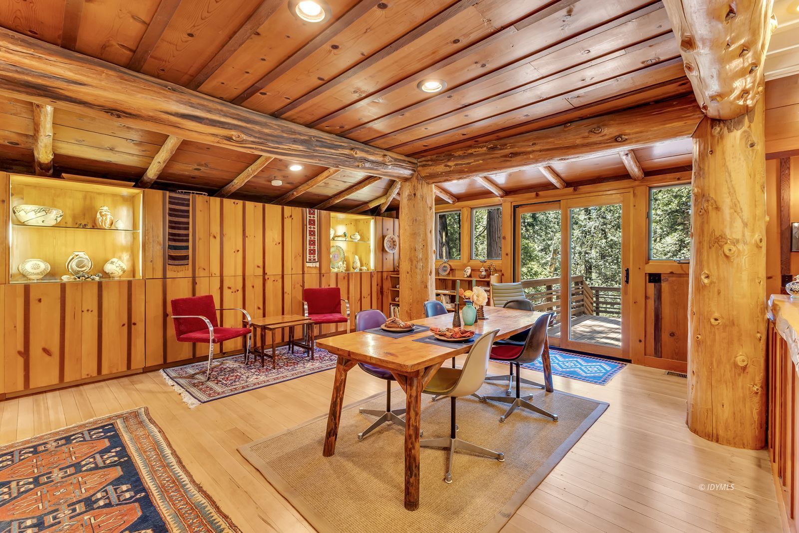 25100 Indian Rock Road Idyllwild, CA 92549 - Photo 33 of 75 a patio with patio lots of furniture and wooden floor