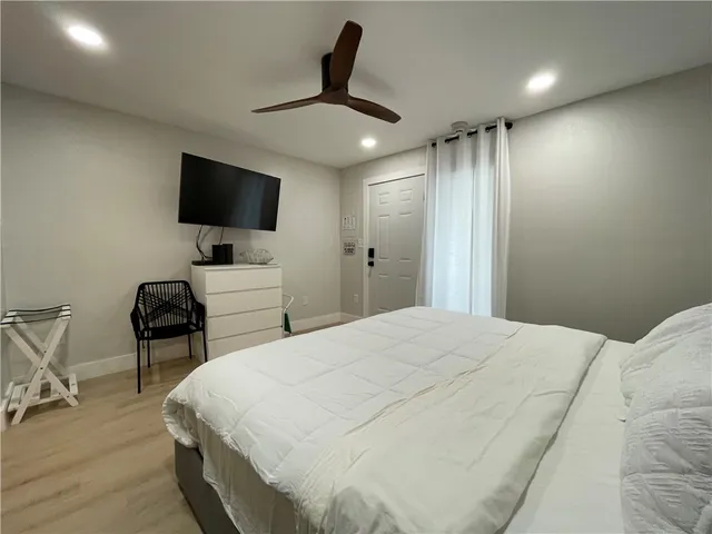 a bathroom with a double vanity sink and mirror